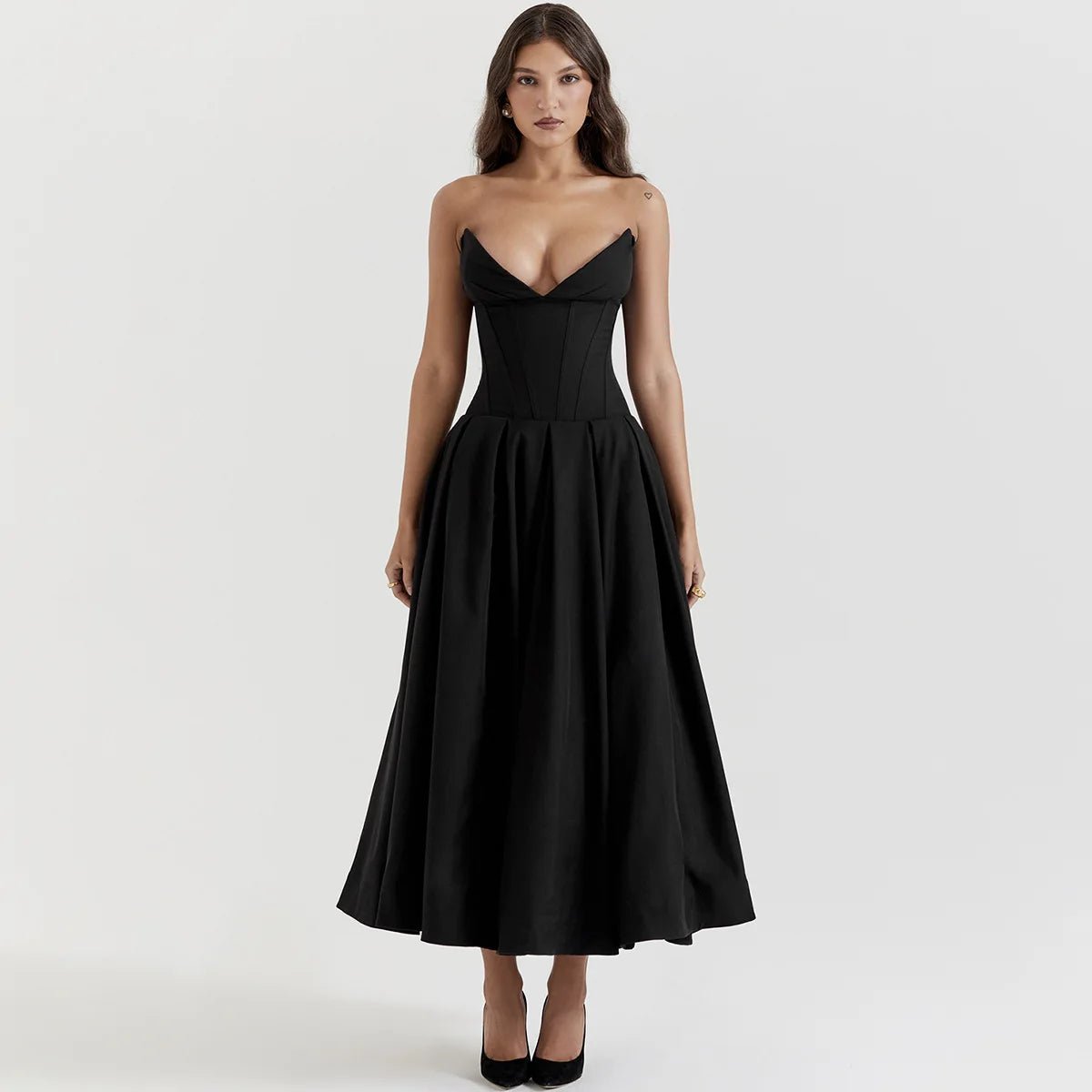Woman wearing the red Scarlett strapless fit and flare midi dress for a fall wedding guest look